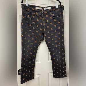 Anthropologie Pilcro Black Cropped Jeans with Orange, flower detail. Size 33
